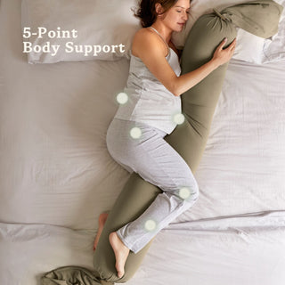 Woman using a body pillow with 